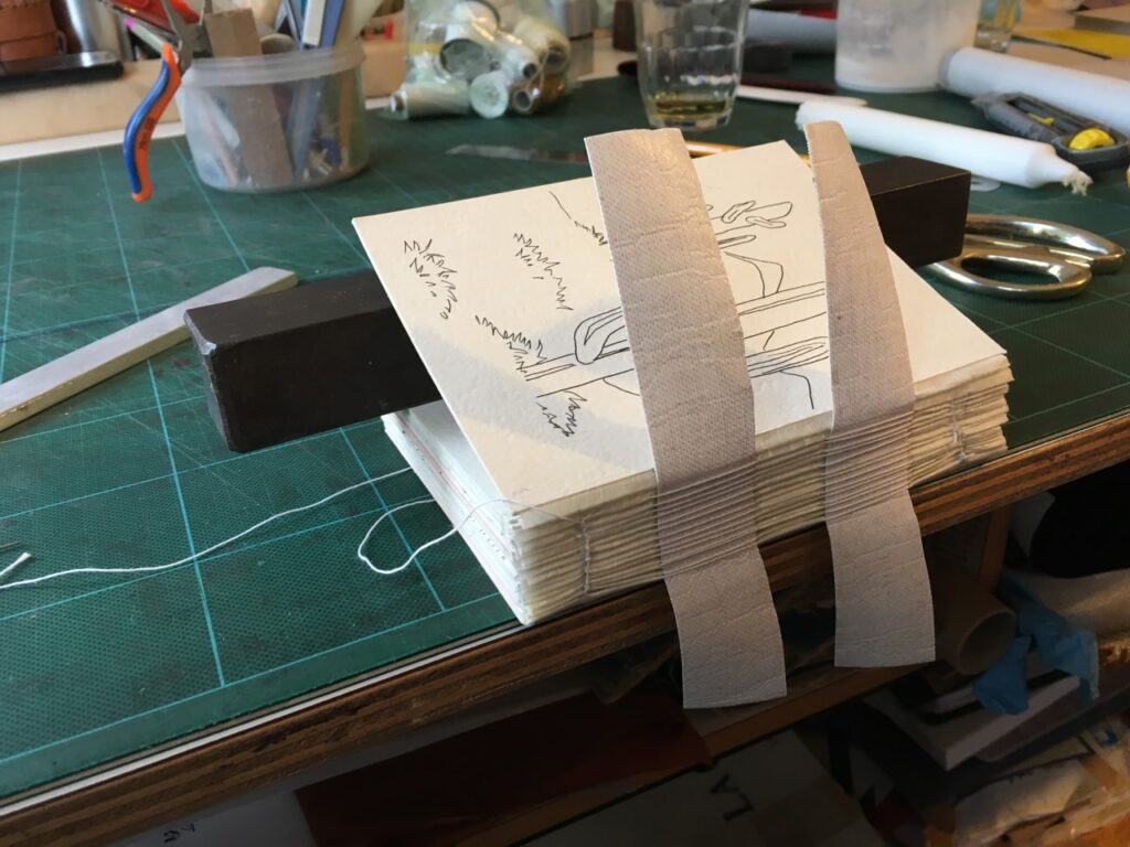 תפירת דפים פנימיים בספר